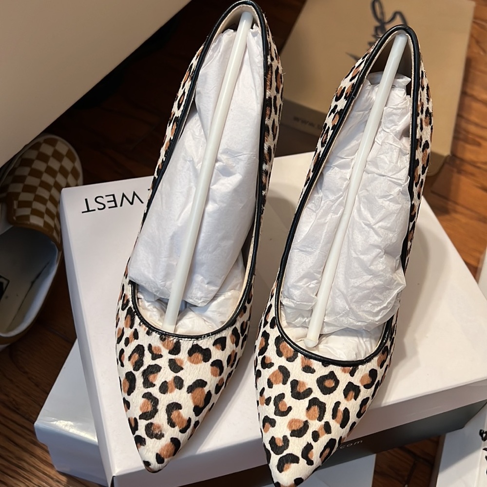 Nine West cheetah print pointy toe heels.
